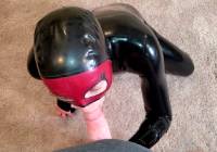 Rubber Doll Sucking Cock